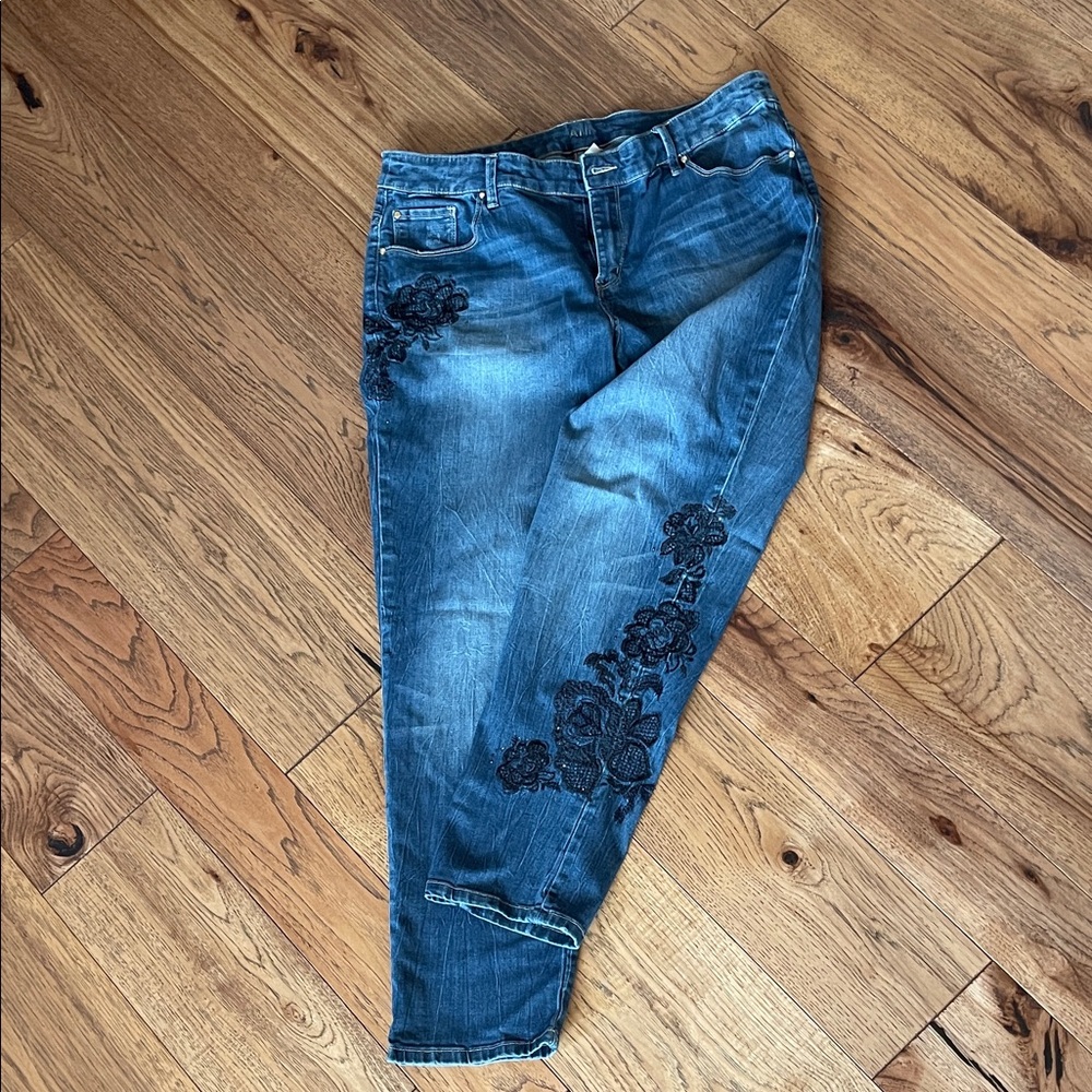 Embroidered jeans fancied up with black stitching